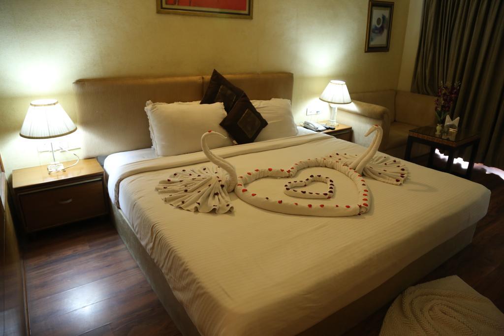 Meuse Jupiter Business And Luxury Hotel Nashik Room photo